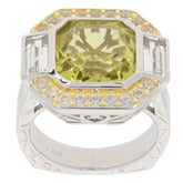 Emerald yellow lemon quartz sterling silver ring with accent stones, showcasing an elegant design and brilliant gem.